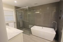 Newcastle Bathroom Remodeling Ideas: Comparing Choices Around tile layout, finish samples and pet-care dust control Bellevue Bathroom Renovations Near Me for Bellevue Bathroom Remodeling, focused on fixture placement