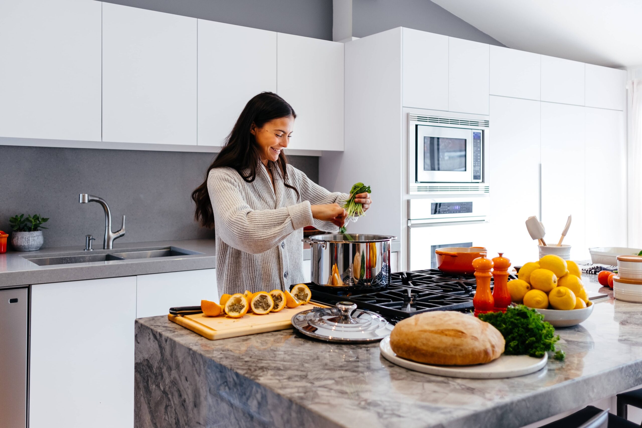 A kitchen remodel design with modern appliances, sleek countertops, and ample storage.